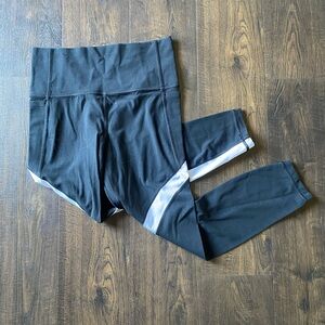 athleta salutation stash pocket 7/8 tight black women’s small athletic leggings